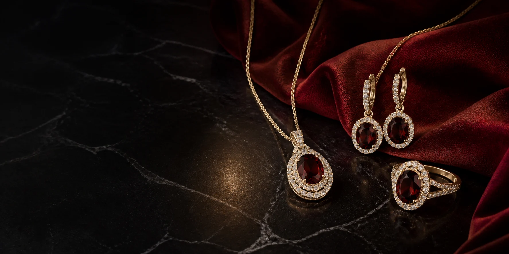 Ruby and diamond jewelry arranged on burgundy velvet
