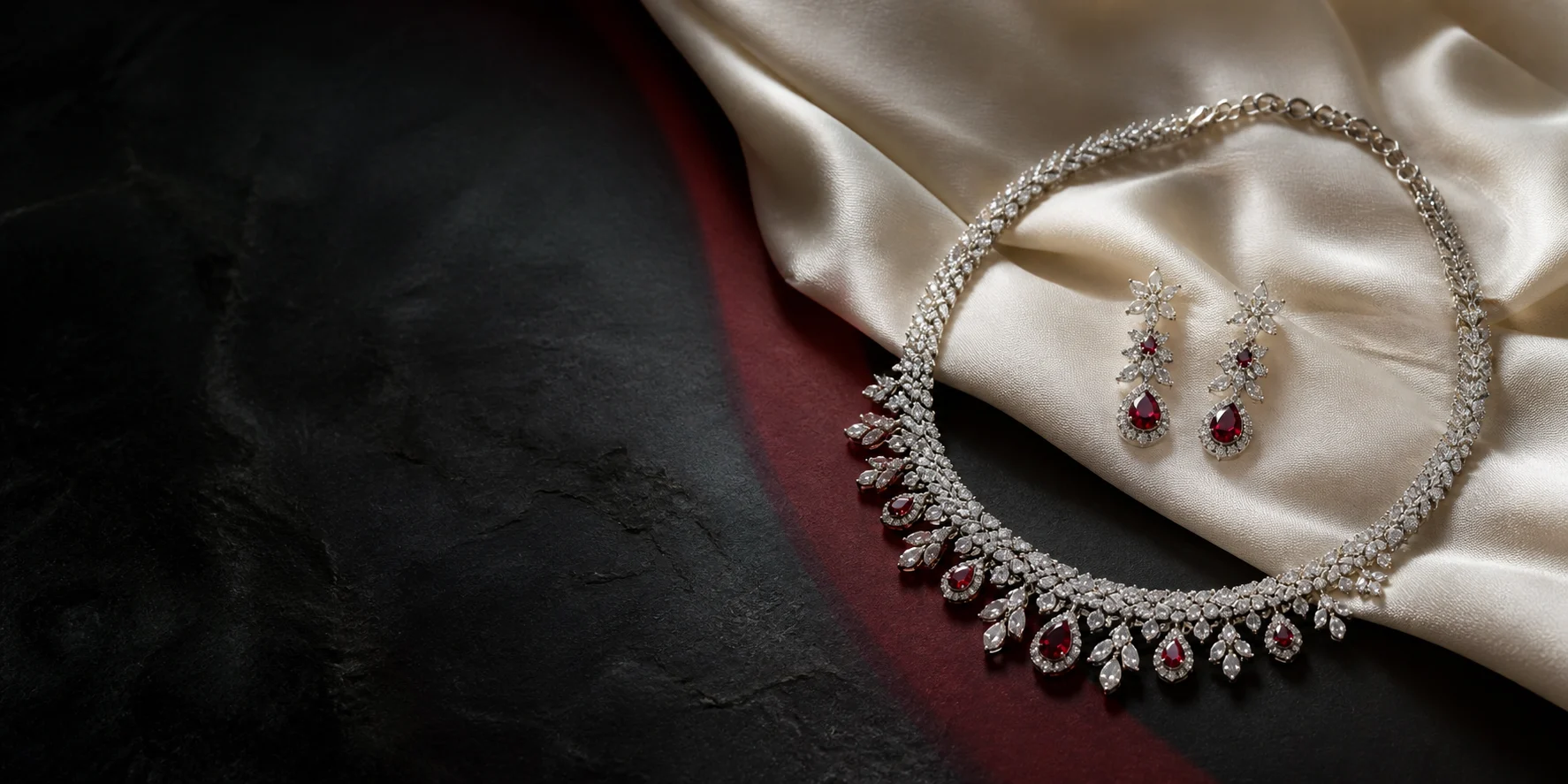 Diamond and ruby necklace on ivory silk